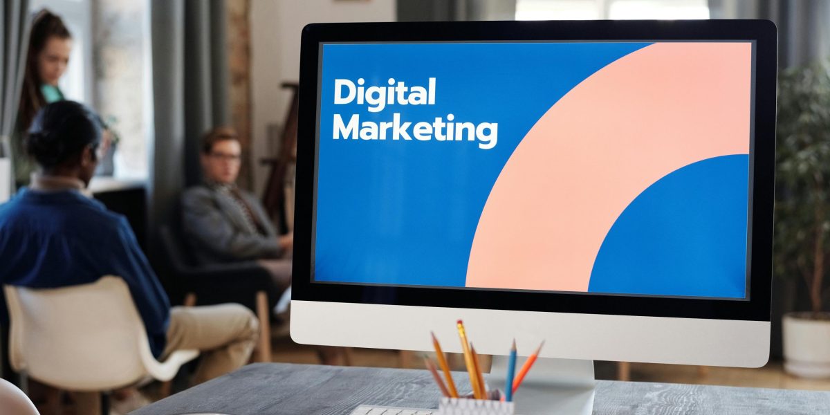 Professionals in a creative office plan digital marketing strategies.